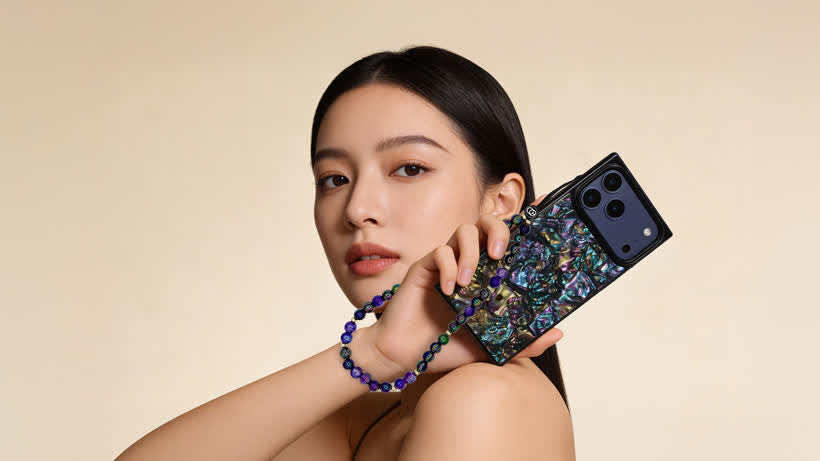 A rectangular iPhone case with flat sides and sharp corners, shown against a soft neutral background