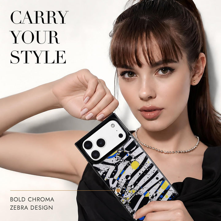 COCOMII zebra print MagSafe iPhone case in Bold Chroma - held by a model