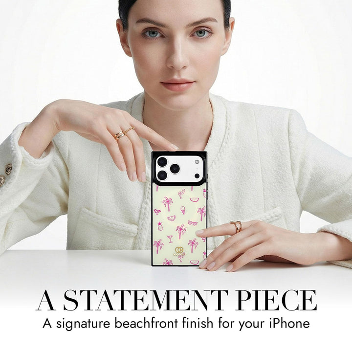 COCOMII coastal print MagSafe iPhone case in Flamingo Paradise - held up on a table as a statement piece