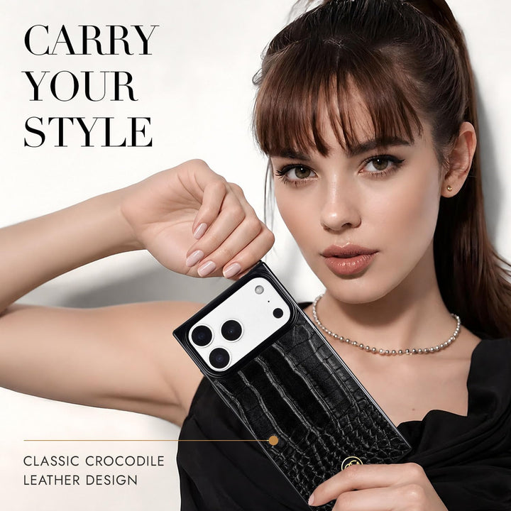 COCOMII croc-embossed MagSafe iPhone case in Black - held by a model