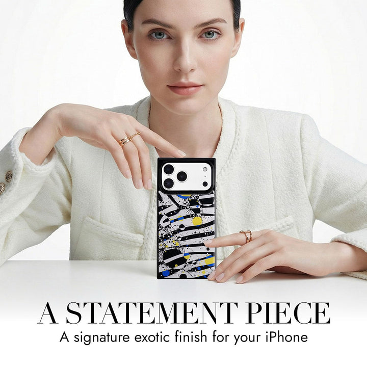 COCOMII zebra print MagSafe iPhone case in Bold Chroma - held up on a table as a statement piece